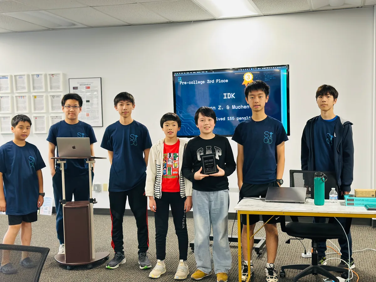 Students and organizers standing together during the awards ceremony